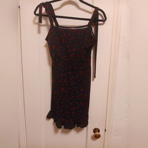Beautiful black dress with red hearts by urban outfitters size S